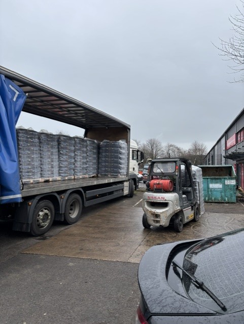 Forklift unloading bags