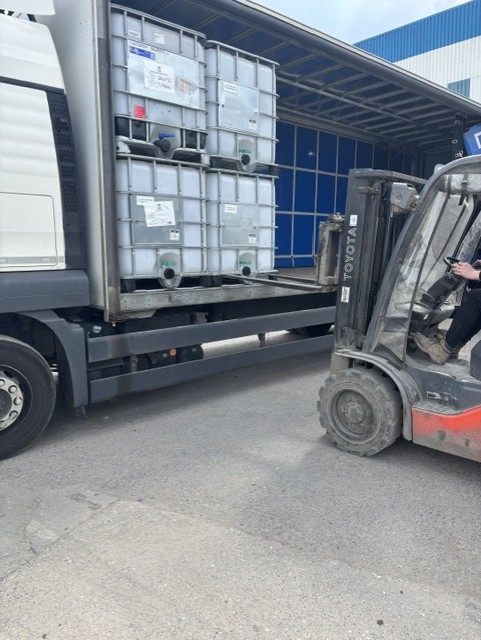 Forklift loading IBC containers